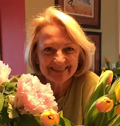 Janet with her peonies and tulips.