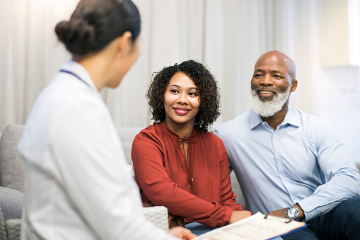 doctor talking to patients